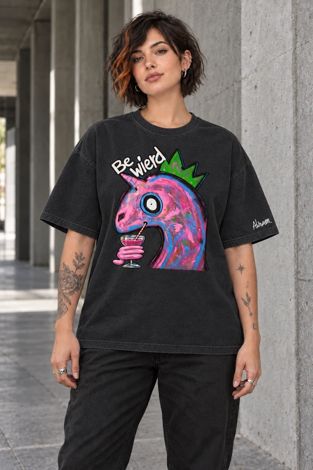 Be Wierd T-Shirt in Retro Black — female model in concrete walkway; AI visualization